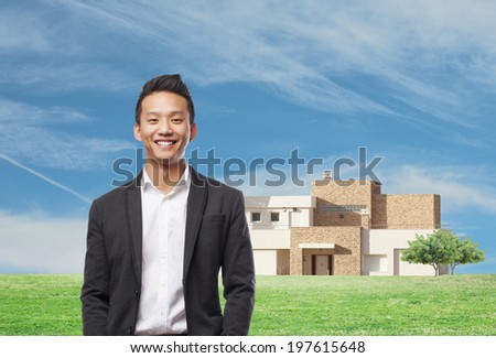 handsome young asian man in front of his house