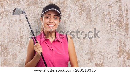 portrait of pretty girl holding a golf stick