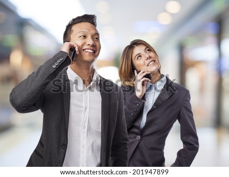 A business young man and woman working together as a team