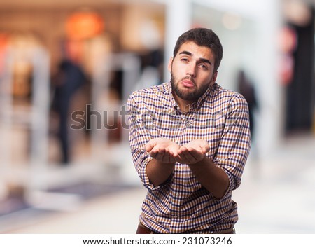 portrait of a young man asking for money