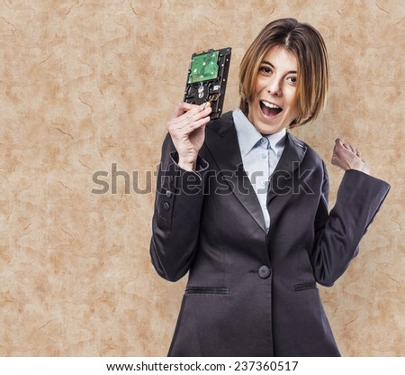 Portrait of happy young business woman with a hard drive