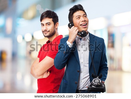 chinese man talking with telephone