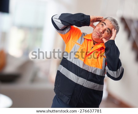 portrait of a sad worker tired of his job