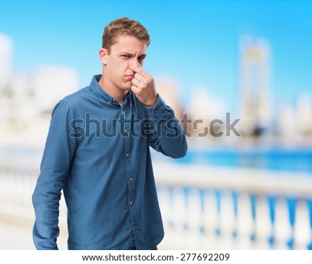 sad young-man smelling something