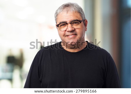 portrait of a mature man wearing glasses
