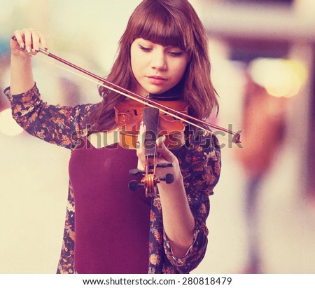 young woman playing violin