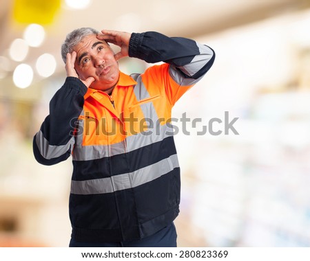 portrait of a sad worker tired of his job