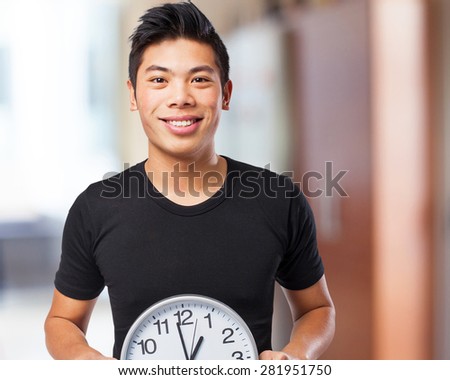 happy chinese sport man with clock