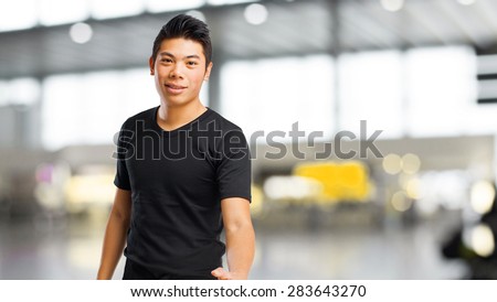 chinese man doing a welcome gesture