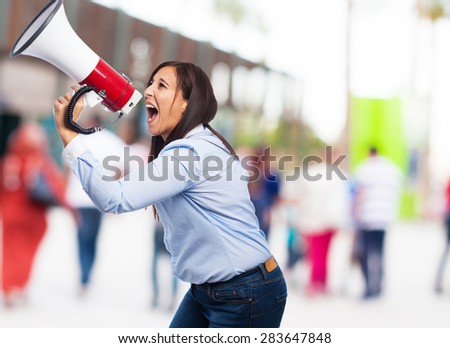 happy young woman with megaphone