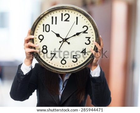 cool business-woman with clock