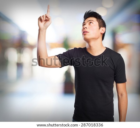 cool chinese-man pointing up