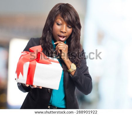 black woman thinking about a gift