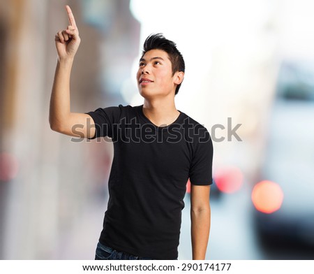 cool chinese man pointing up