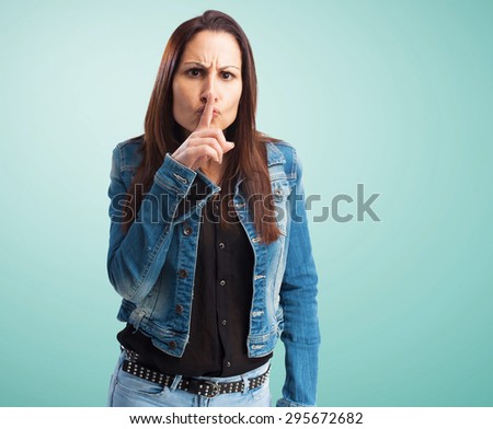 woman doing silence gesture