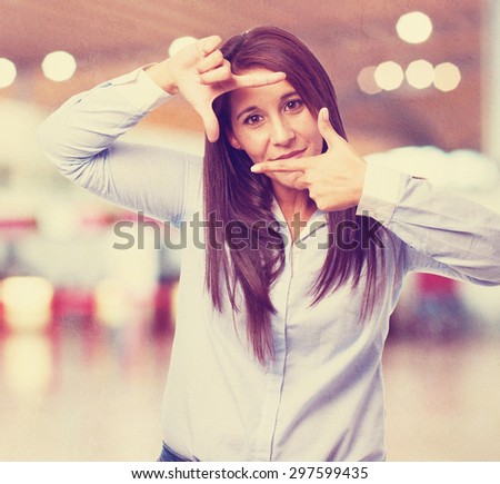 woman doing a frame gesture