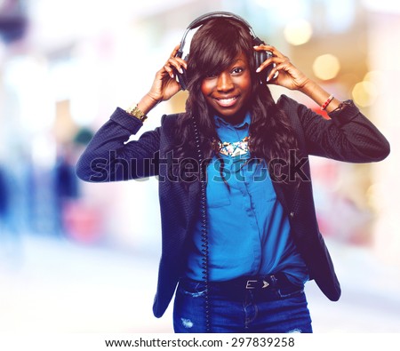 happy black woman with headphones