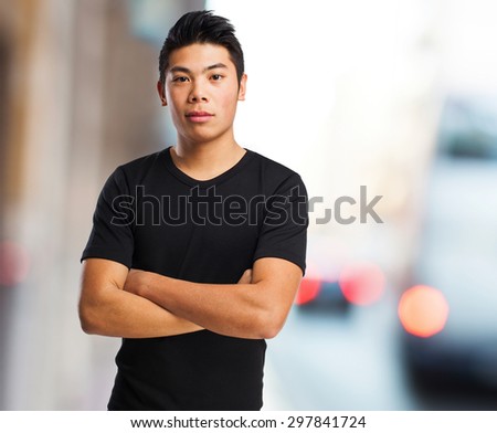 chinese man crossing arms