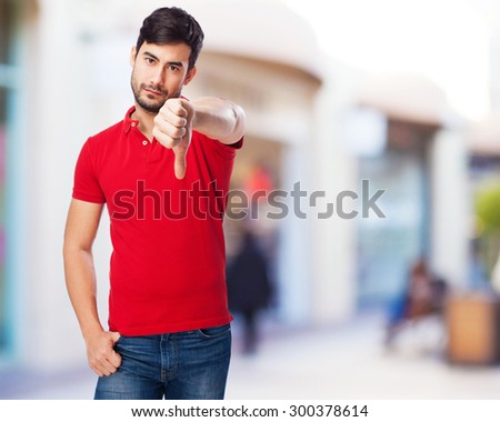 asian man with thumb down