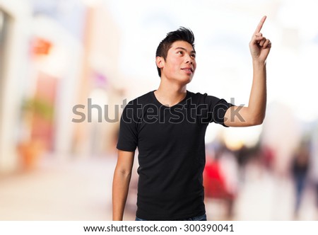 cool chinese man pointing up