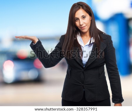 cool business-woman holding something