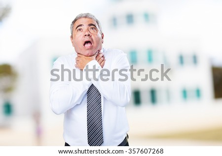 business man drowning gesture