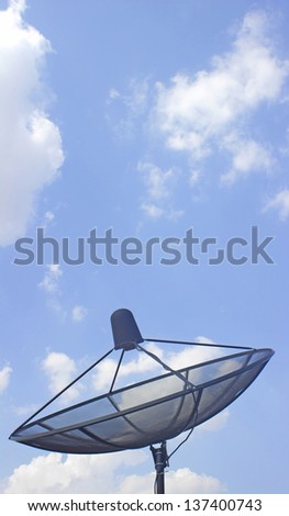 The satellite dish with the blue sky background