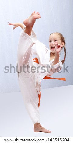 Professional girl does karate kick