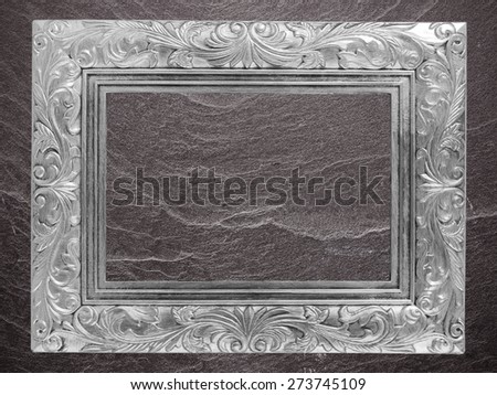 Gray frame Vintage photo frame on marble stone wall background