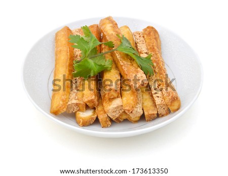 Fried Tofu in white plate on white