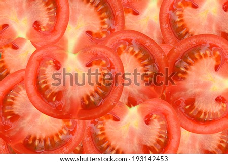 Healthy natural food, background. Tomatoes slices. More background of fruits and vegetables