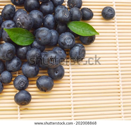 blue berry on bamboo mat