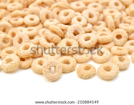 healthy cereal rings spoon on white