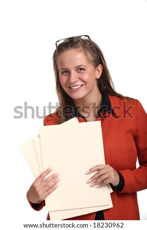 Studio portrait of a beautiful young smiling business woman holding files in her hands, isolated on white background