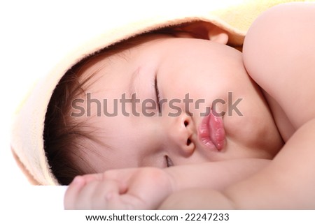 bright close-up portrait of adorable sleeping baby over white background