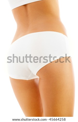 stock photo Slim tanned woman's body Isolated over white background