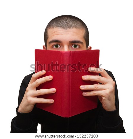 Man hiding behind a book - stock photo
