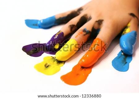 stock photo : The hand of a child. Fingers overcast with color from painting on white background.