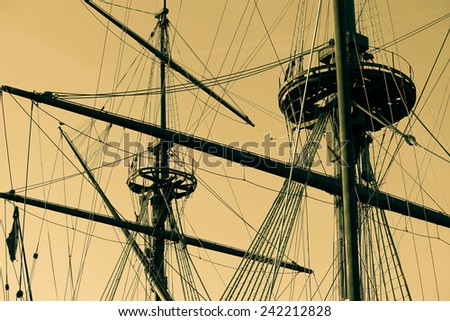 Vintage ship mast, sepia color, retro photography.