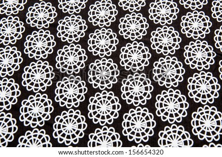 Black tissue with white round abstract figures
