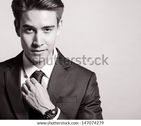 Handsome man smiling (black and white portrait)