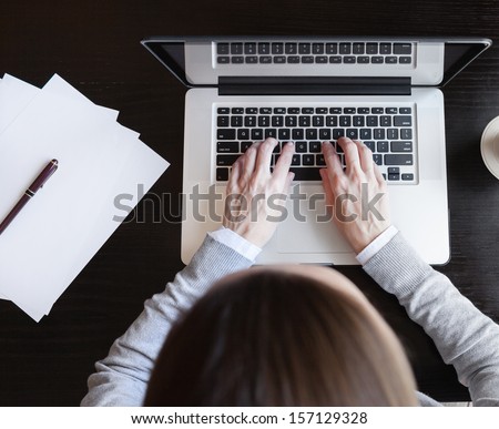 Businesswoman working on computer in the office