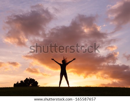 Silhouette Of Happy Woman Enjoying Nature. Freedom Concept.