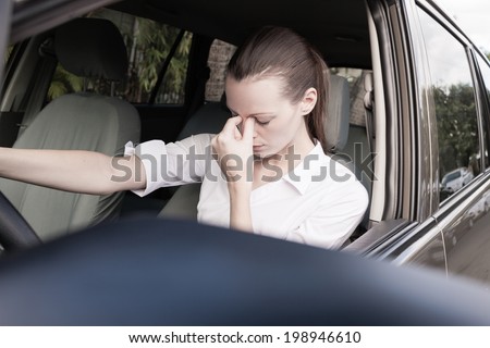 Stressed woman driver - transportation concept.