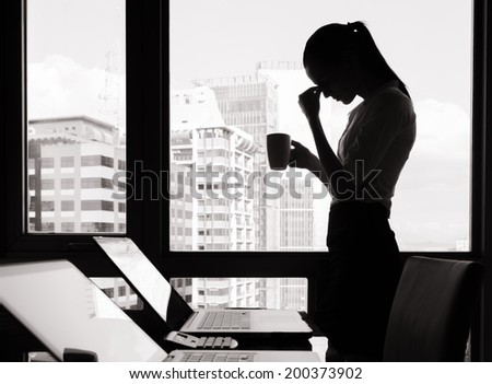 Depressed woman in the office.