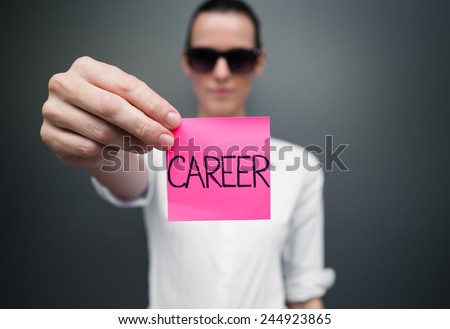 Woman showing paper with career sign on it