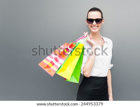 Woman with shopping bags. Shopper. Sales