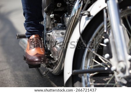 Male going for a motorcycle ride.