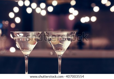 Pair of martini drinks.