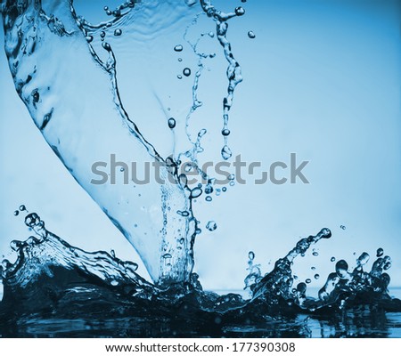water pours messy jet forming a beautiful abstract background.